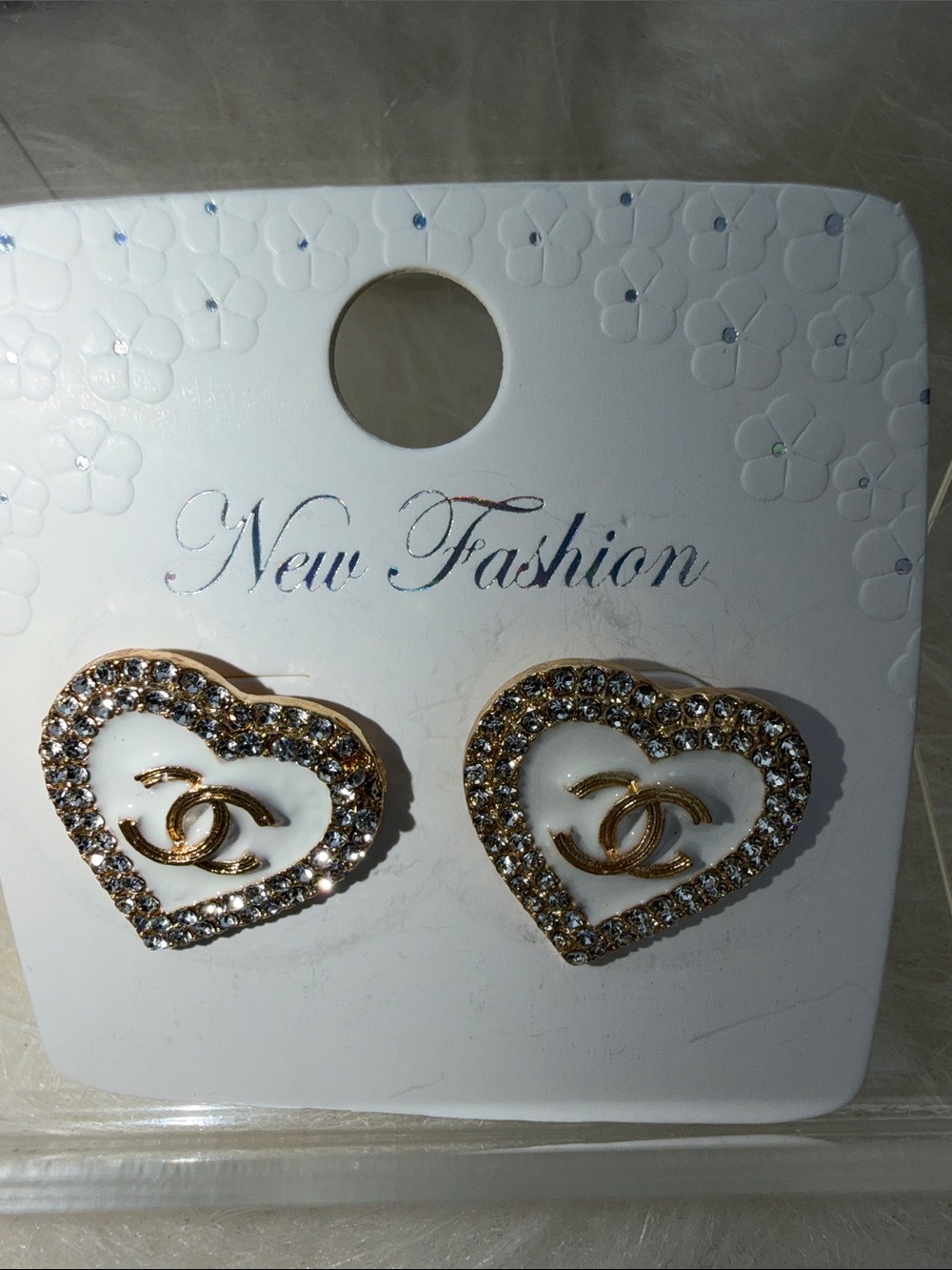 CC Earrings NWT CC goldtone middle surrounding rhinestone hearts
